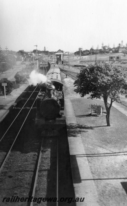 P03187
Passenger train, elevated view, platforms and signal box, repeater signals, Cottesloe, ER line.
