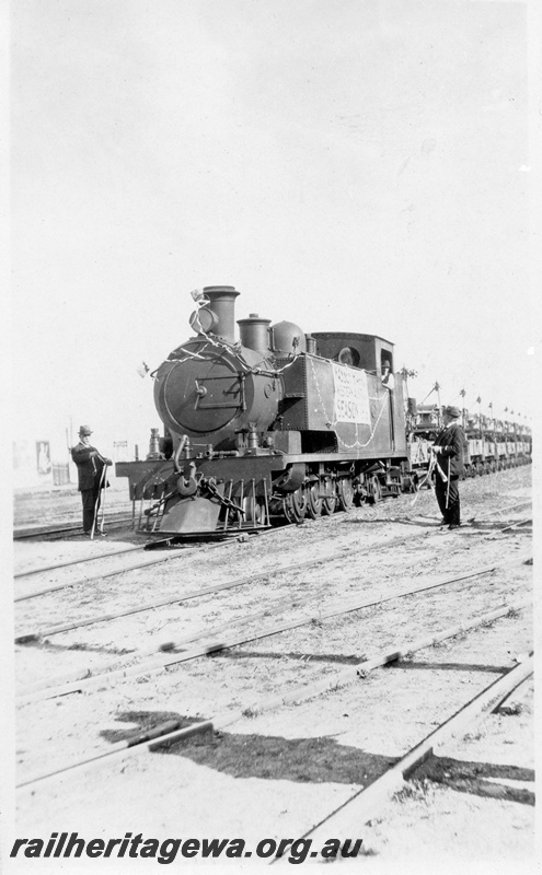P03454
3 of 3, K class 186 steam locomotive hauling a special Massey-Harris farm machinery train, front and side view, North Fremantle, ER line.
