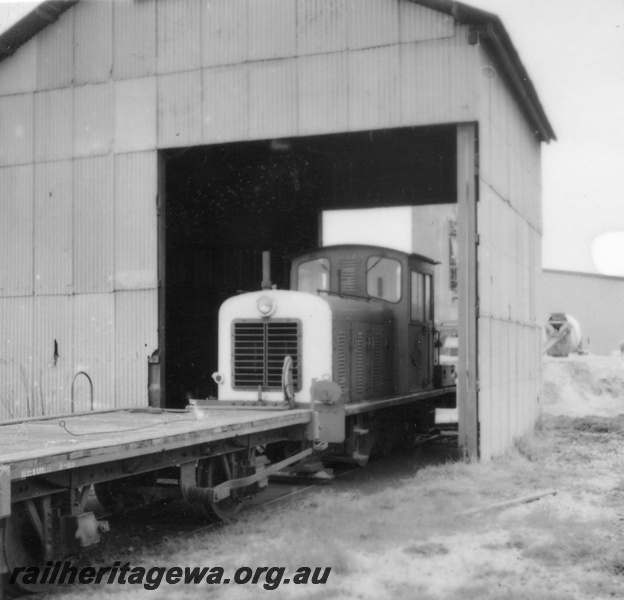 P03492
Z class 1151 coupled to a four wheel flat wagon, coaling shed, loco depot, Albany, GSR line, loco parked in the coaling shed.

