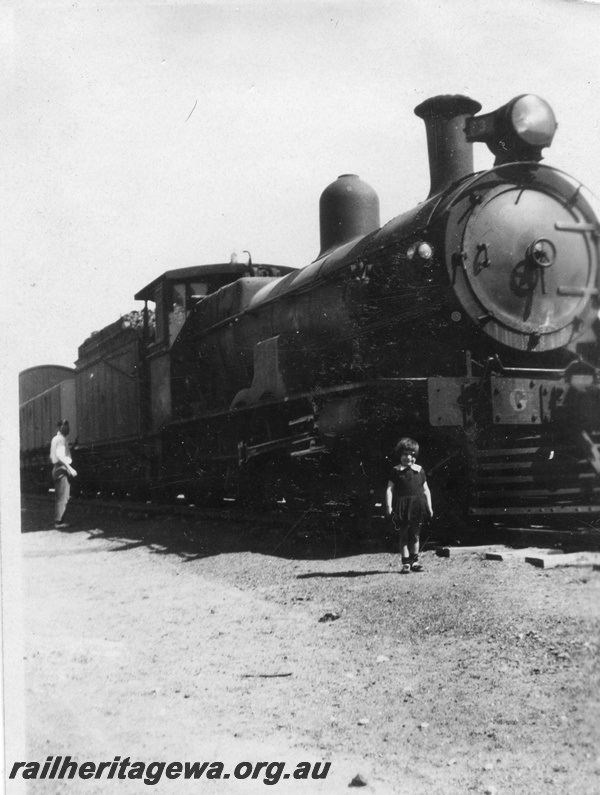 P03506
Commonwealth Railways (CR) G class steam locomotive, side and front view, on Trans Australian Railway, c1929-30.
