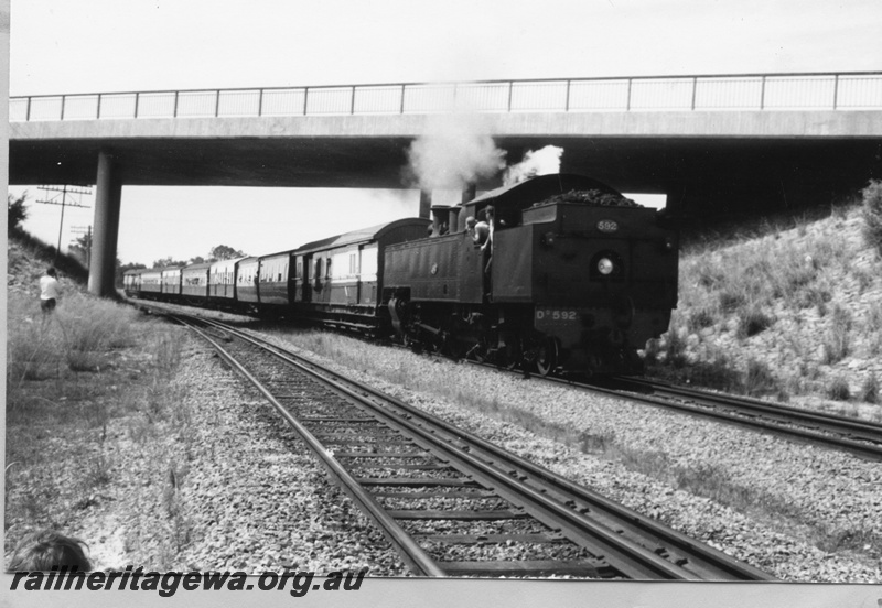 P03509
DD class 592 steam locomotive running bunker first, on ARHS Twilighter Tour, side and end view, Forrestfield.
