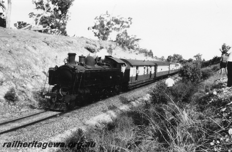 P03510
DD class 592 steam locomotive, on ARHS Twilighter Tour, front and side view, going through a cutting near Wellard.
