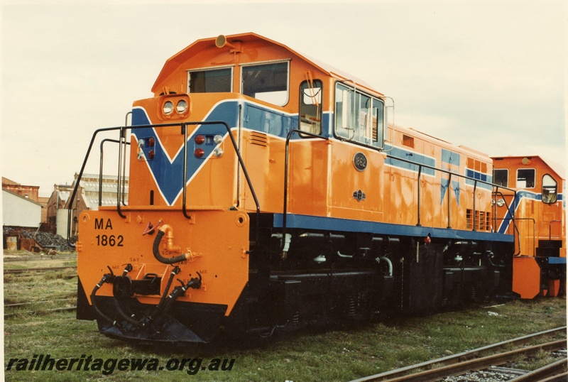 P03555
MA class 1862 diesel locomotive, front and side view, in orange livery, c1970s.
