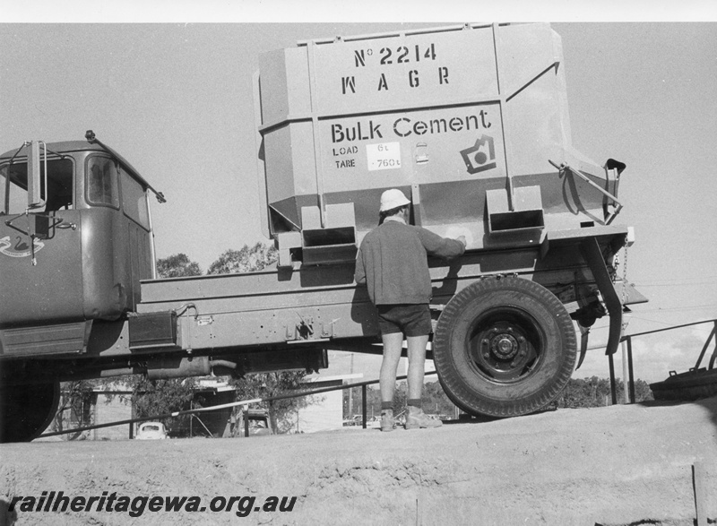 P03565
WAGR Bulk Cement container, no. 2214, on a WAGR Railway Road Service truck, side view
