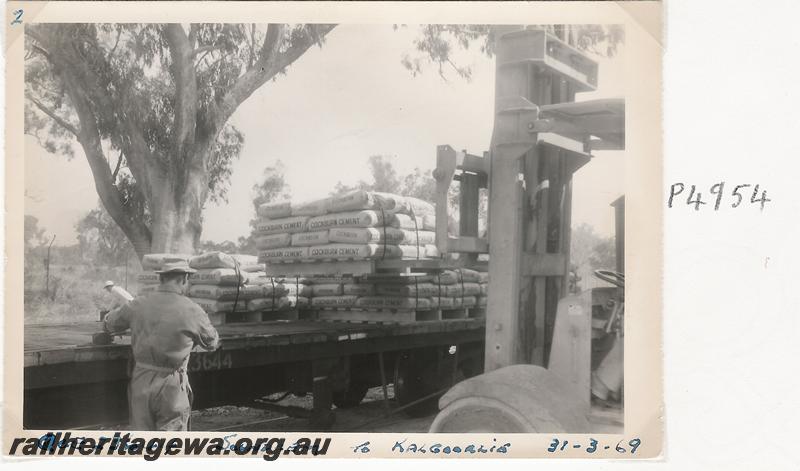 P04954
QCE class 23644 bogie flat wagon, Soundcem, being loaded with bags of cement for Kalgoorlie, a set of five photos
