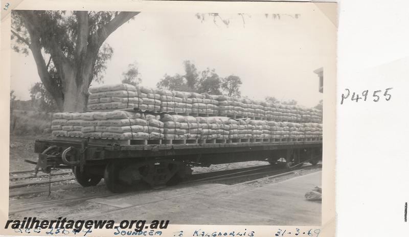 P04955
QCE class 23644 bogie flat wagon, Soundcem, being loaded with bags of cement for Kalgoorlie, a set of five photos
