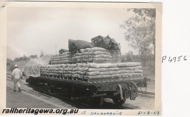P04956
QCE class 23644 bogie flat wagon, Soundcem, being loaded with bags of cement for Kalgoorlie, a set of five photos
