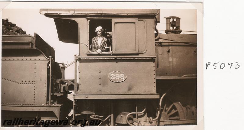 P05073
E class 298, Bunbury, view of cab with a smartly dressed woman looking out the cab window
