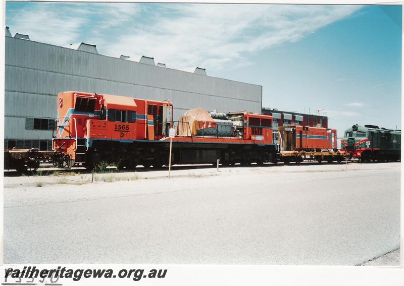 P05350
D class 1565, with the long hood removed placed on flat wagon behind the loco, Forrestfield loco depot
