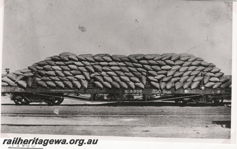 P05660
QA class 9389 bogie flat wagon loaded with 320 bags of wheat, side view
