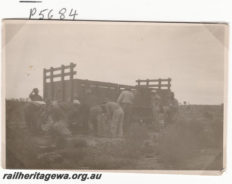 P05684
WA Goldfields Firewood Co. wagon, derailed, side view. At Kurrawang.

