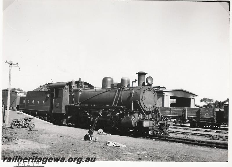 P05699
MRWA loco C class 15, Watheroo, MR line, goods train, L class wagon in background.
