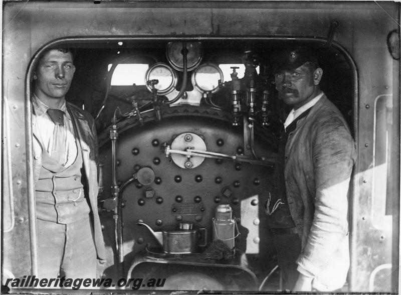 P05756
Driver and fireman in cab of a Baldwin loco, view looking into cab from tender
