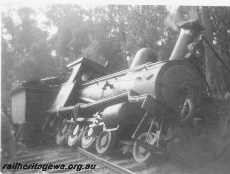 P05934
1 of 6 views of derailment of Millars loco No.72, side and front view of loco derailed
