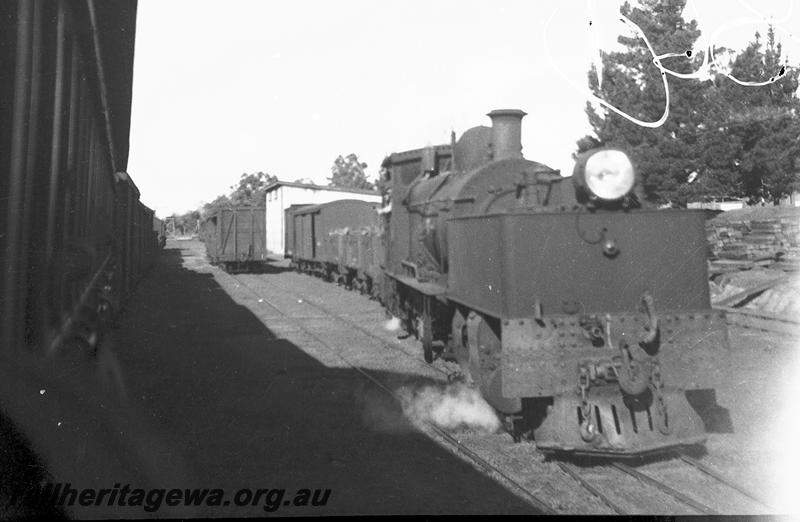 P06125
MS class 426 Garratt loco, goods shed, water tower in background, Boyup Brook, DK line, on down mixed, shunting
