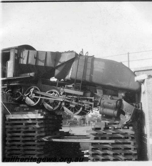 P06312
ASG class 26 Garratt, derailed and hanging over the Davies Street subway, Claremont, side on view.
