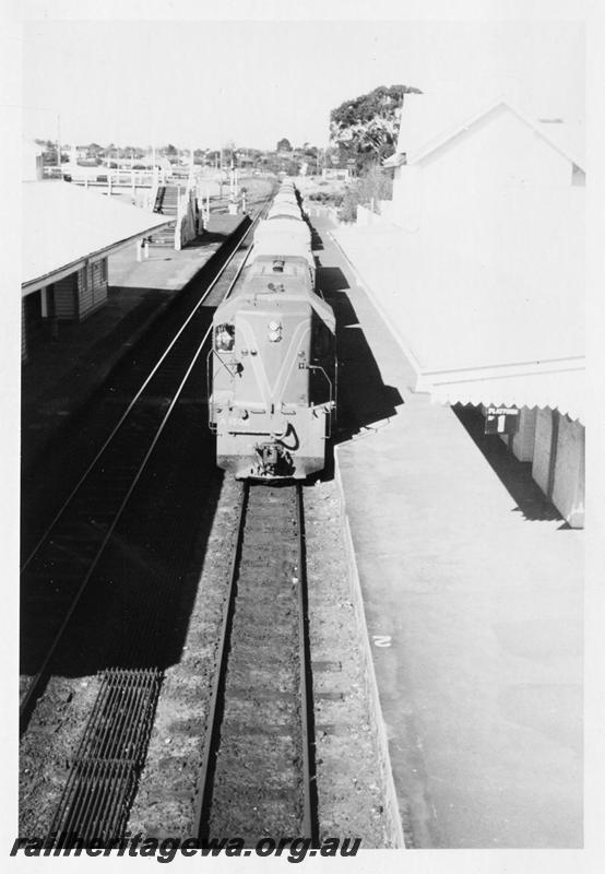 P06485
A class 1502, Claremont Station, on No.852 Goods train, elevated head on view
