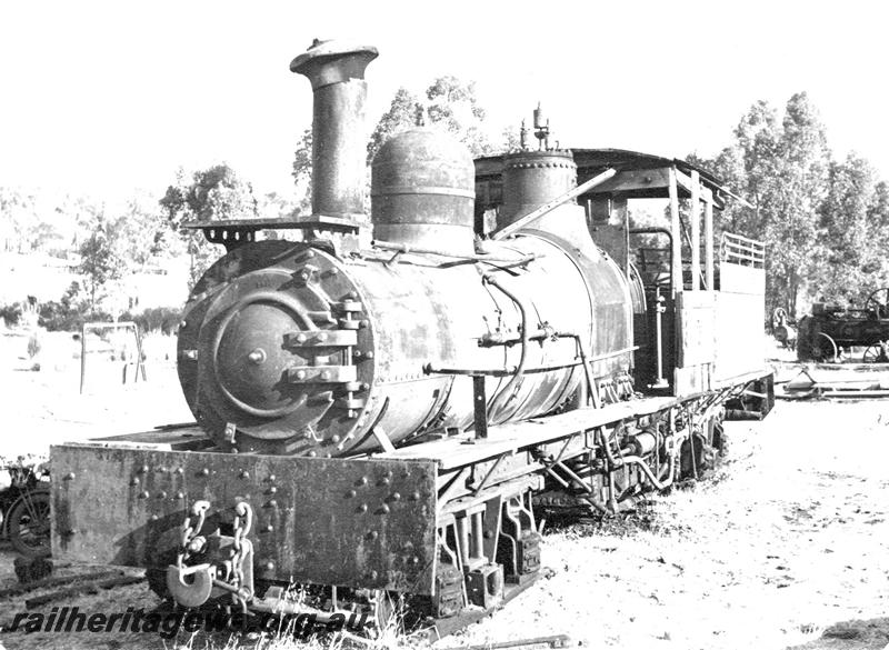 P07049
Bunnings Shay loco, front and non cylinder side view, derelict. (large format print in MC1B2G)
