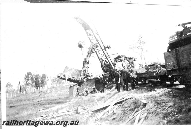 P07064
5 of 8 views of the smash at Wokalup, SWR line, shows steam crane No.23 lifting the remains of D class 5171
