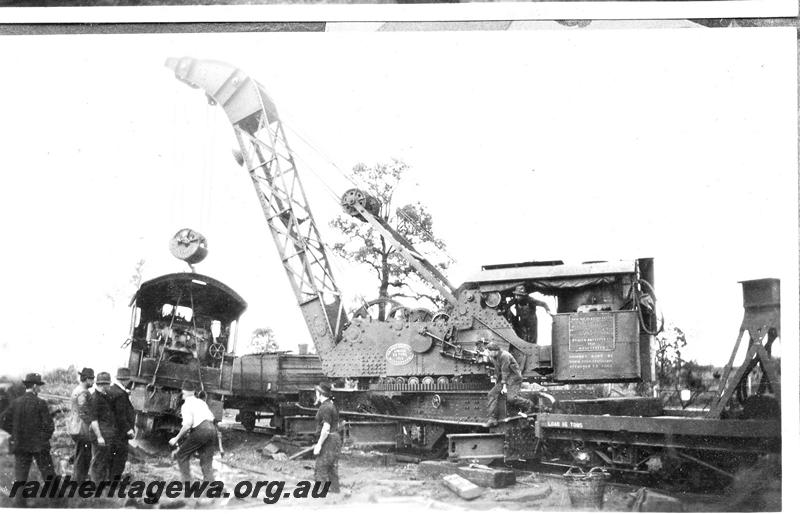 P07067
8 of 8 views of the smash at Wokalup, SWR line, shows steam crane No.23 lifting the loco E class 345, side view of crane
