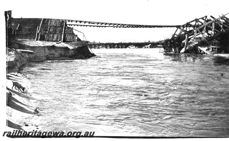 P07085
Fremantle railway bridge after collapse, side view. Postcard

