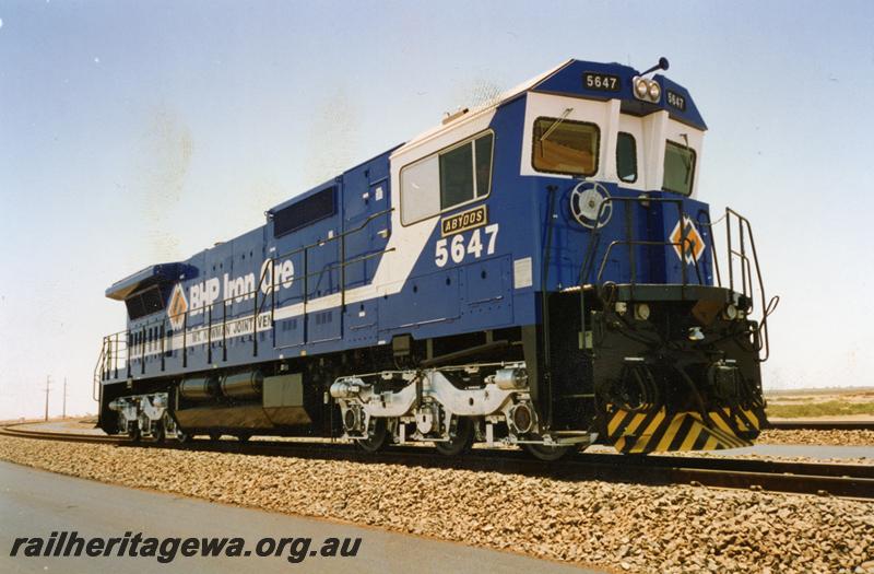 P07148
BHP Iron Ore loco No.5647 in blue & white livery, side and front view
