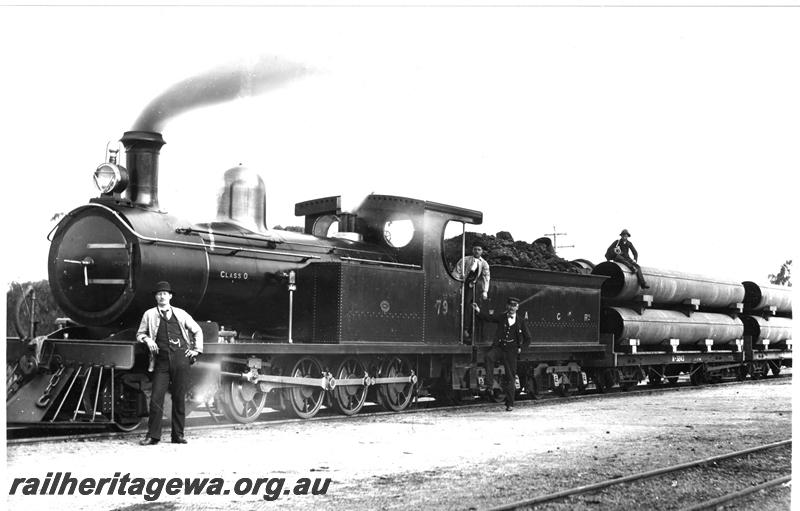 P07429
O class 79 with load of pipes for the Eastern Goldfields Water Supply Scheme, front and side view
