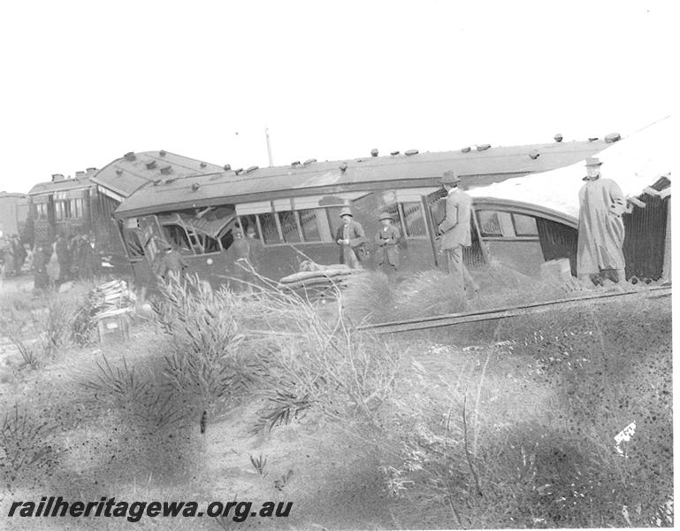 P07452
3 of 4 views of the derailment of a MRWA Mail Train at Gunyidi, MR line, carriages derailed
