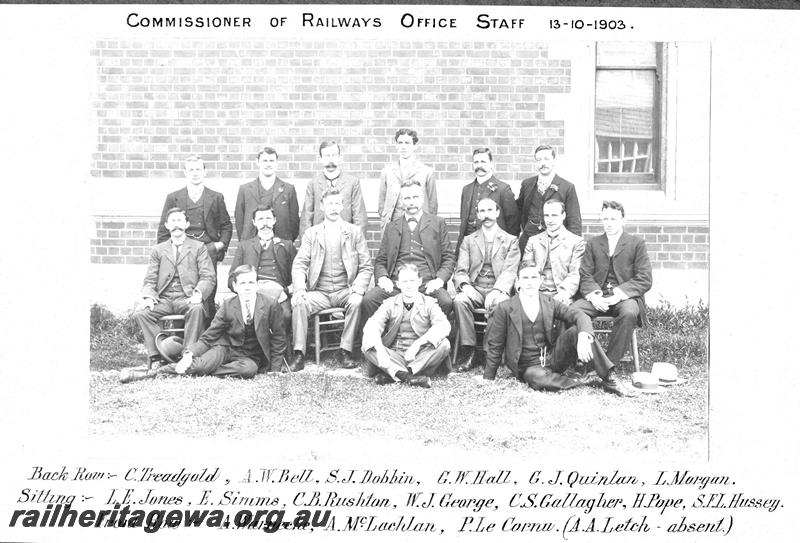 P07461
Group photo of the Commissioner of Railways Office Staff. Names Back Row: C. tread gold, A. W. Bell, S. J. Dobbin, G. W. Hall, G. j. Quinlan, L. Morgan, Sitting: L. E. Jones, E. Simms, C. B. Rushton, W. J. George, C. S. Gallagher, H. Pope, S. F. L. Hussey, Front Row: A. Warnecke, A. McLachlan, P. Le Cornu. 
