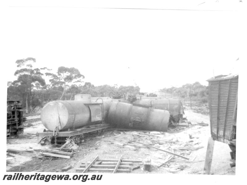 P07752
3 of 6 views of a derailment at Norseman, CE line on 31.1.1962. Ted Bosworth was the Officer In Charge of the Breakdown crew. Tank wagons derailed.

