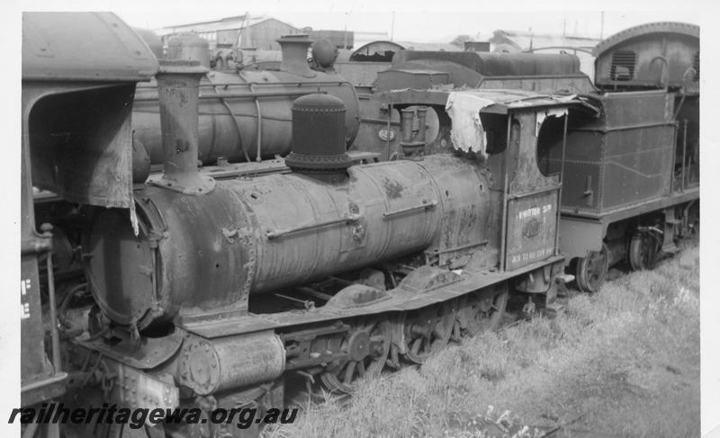 P08219
A class 10, stowed at the Midland Graveyard without tender, front and side view

