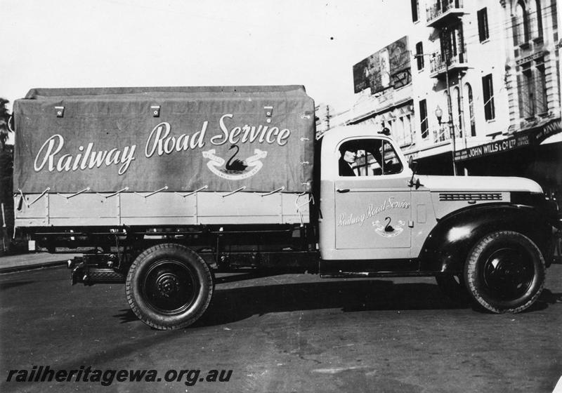 P08390
Railway Road Service truck with canvass cover over the tray, side view
