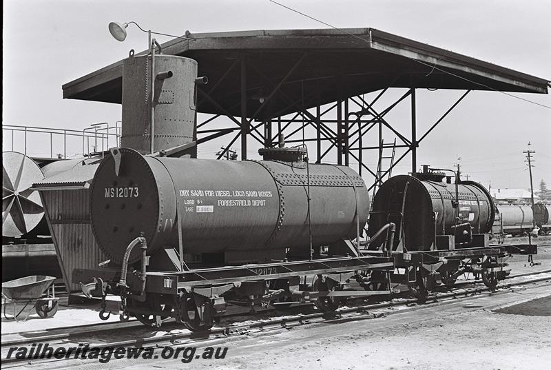 P09211
MS class 12073 loco sand tanker coupled to another MS class wagon, Bunbury loco depot, end and side view 
