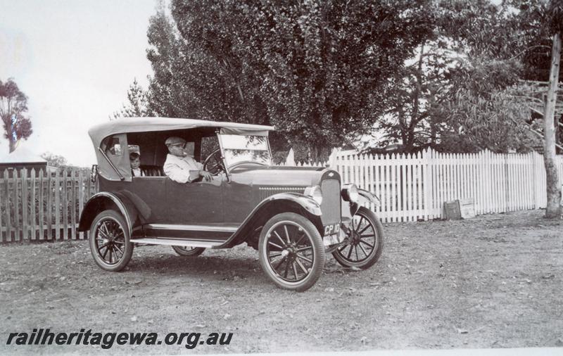 P09351
Mr Copley, station master at Boyanup from August 1921 until November 1928 in his car in front of the station masters house, Boyanup, PP line
