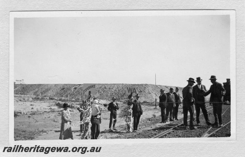 P09354
Officials standing on and around the track on the occasion of the first through train to Esperance taken at Norseman, CE line
