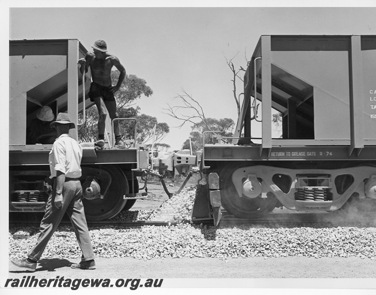 P10735
Ballast spreading using non descript ballast plough attached to a standard gauge WSH class ballast hopper.
