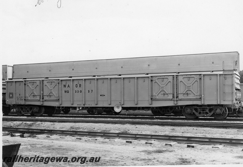 P10921
Standard Gauge WG class 33037 open wagon at Midland Workshops displaying a grain loading shute as fitted to some of these wagons to assist in cartage of grain.
