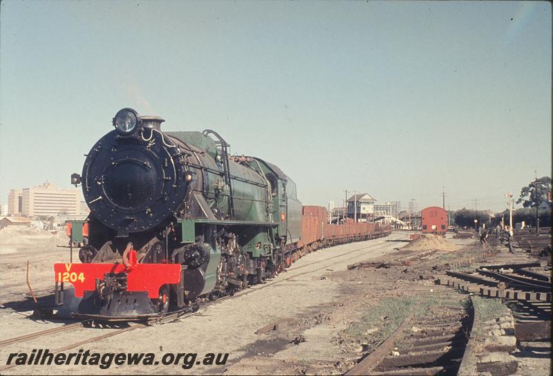 P12169
V class 1204, shunting down train, new section of East Perth goods yard. SWR line.
