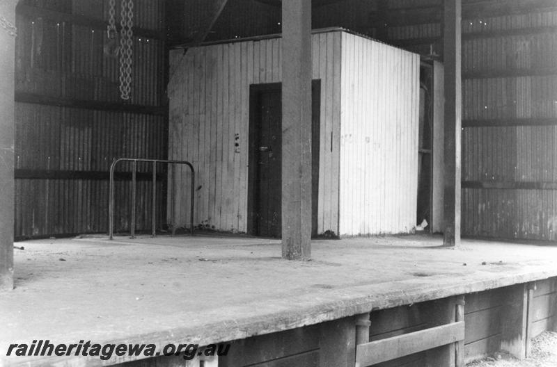 P12599
Goods shed, Armadale, SWR line, internal view showing scales and small room on platform.
