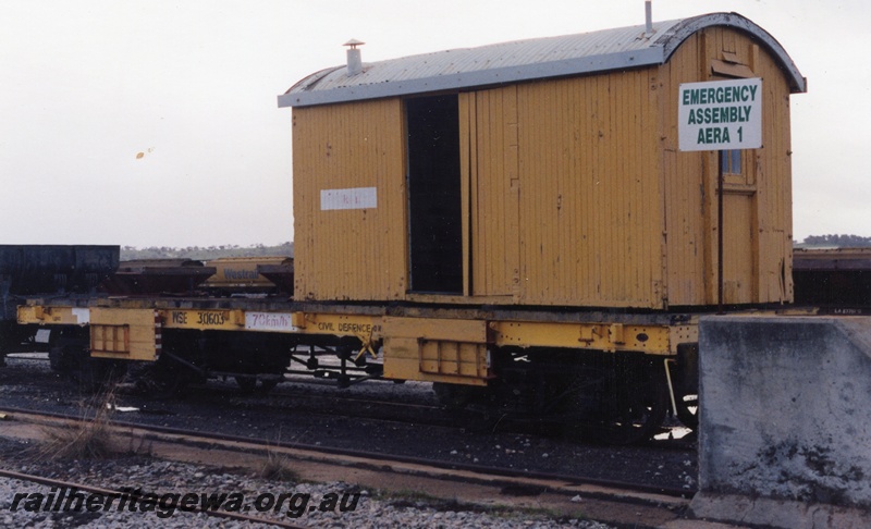 P15566
WSE class 30603, standard gauge flat wagon in the yellow livery with a D type class van body sitting on the deck, 