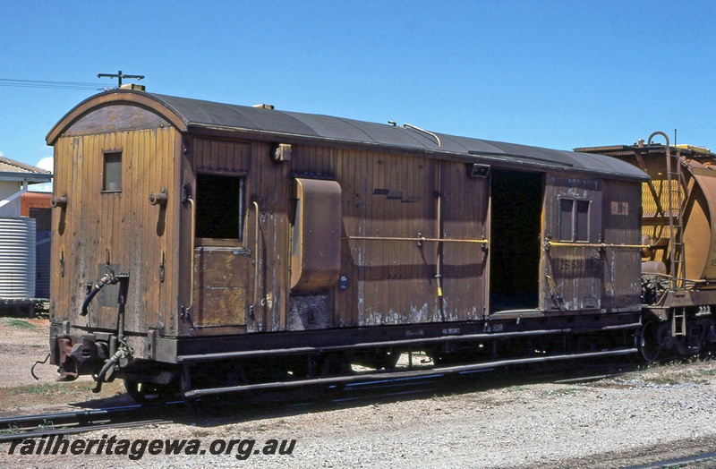 P15642
ZS class 539 brakevan with knuckle couplers, Westinghouse brakes and a radio equiped logo, in a very weathered all over Westrail yellow livery, Geraldton, NR line, guards end and side view

