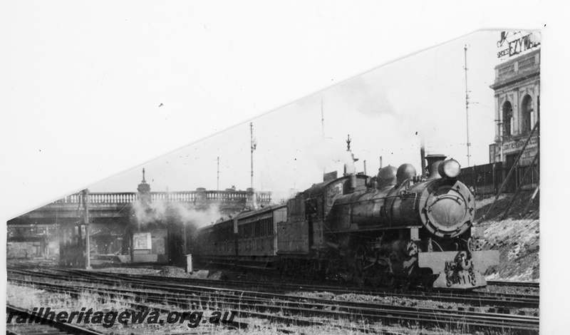 P16398
PR class loco, on passenger train, leaving Perth station, Barrack Street bridge, trackside view

