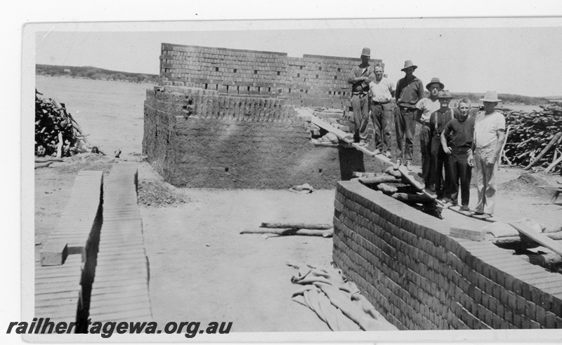 P16809
Commonwealth Railways (CR) - TAR line workers at brick kiln possibly at Naretha. Names of men in photo from top down: Hiskell, Exel, Monger, Flood, Hicks, Stanley, Betts. c1916
