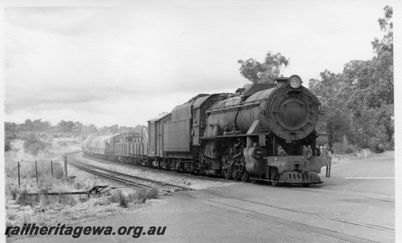 P17515
V class 1220, on goods train, passing level crossing, rural countryside, c1965
