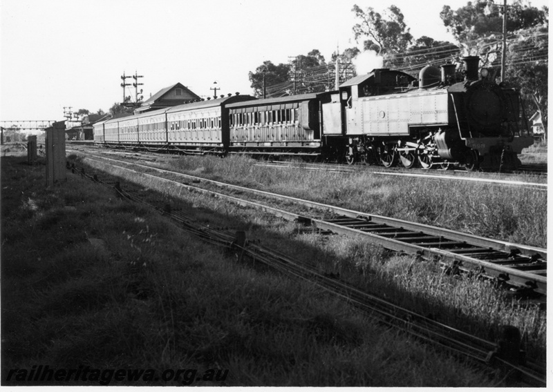 P17685
DD class 598, on Down passenger train deoarting Midland,  including AD class carriage, bracket signals, station building, side and front view, c1965
