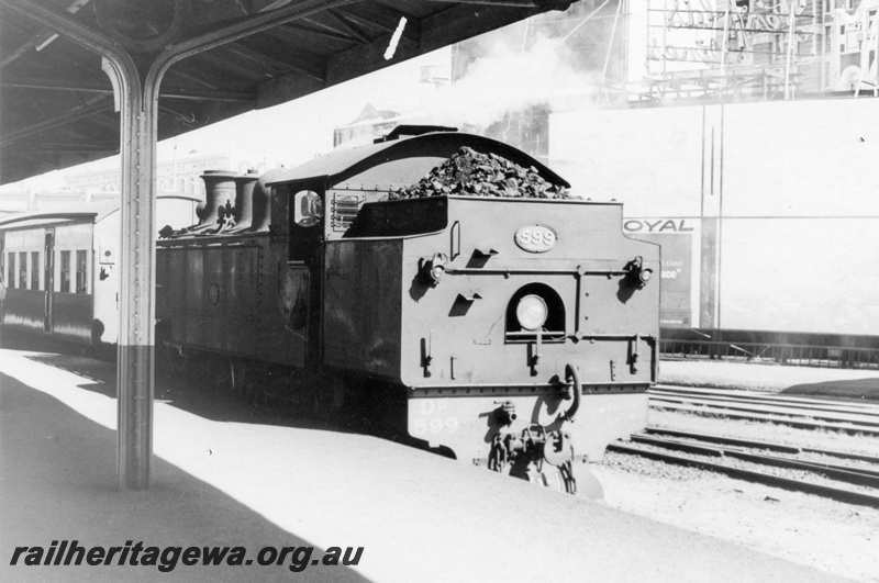 P17697
DD class 599, bunker first, on passenger train, roof support, Platform 7, Perth station, ER line, c1965
