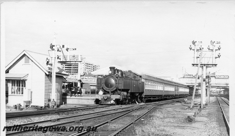 P17699
DM class 583, on Show Special, bracket signals, platform and wooden trackside building, Perth station, ER line
