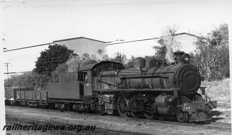P17756
PMR class 728 steam locomotive shunting Picton Junction yard while working 23 Goods train from Perth. Side/Front view of locomotive. R class low sided bogie wagon behind locomotive. Fertiliser works in the background.
