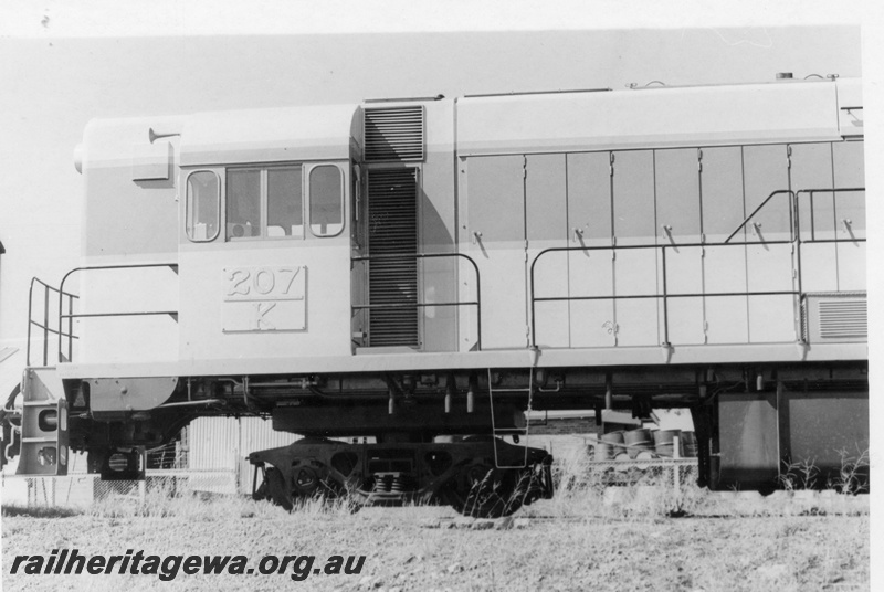 P17775
3 of 3 images of K class 207 on its delivery run to WA at Southern Cross, EGR line, on narrow gauge transfer bogies, side view of cab and transfer bogie
