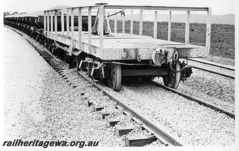 P18016
Derailed wagon, WSP class standard gauge ballast plough, Brixton Street, Kenwick, side and end view

